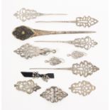 A collection of silver hair ornaments and similar accoutrements probably Dutch, early 19th