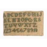 A miniature sampler style pin card, of rectangular form one side worked with alphabet and