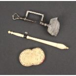 Three sewing tools - comprising a 19th Century ivory tambour hook with steel mount complete with