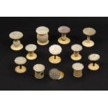 Reel holders and related items comprising nine mother of pearl top reel holders including two pairs,