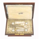 A fine Palais Royal burr yew wood and inlaid sewing box, circa. 1835, with a full complement of