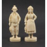 A pair of 19th Century well carved Dieppe ivory figures of a fisherman and companion, in traditional