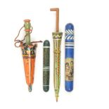 Four brightly decorated continental wooden needle cases two of umbrella form, largest 16cm, and