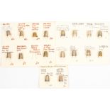 Seventeen thimbles mounted on card mostly steel core Dorcas but including four silver (17)