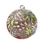 An attractive silver and enamel disc form pin cushion, decorated with leaves and fruit highlighted
