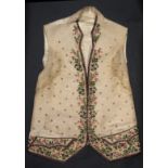 A Georgian silk and floral embroidered waist coat brightly worked with roses, thistles and