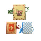Three needle books comprising a Bristol card rectangular example worked in wool with a basket of