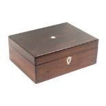 A late Victorian rosewood sewing box, of rectangular form, mother of pearl escutcheon and lid