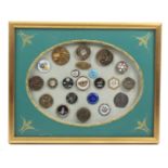Buttons - a fine framed display of twenty two buttons, 18th Century and later including an Italian