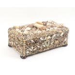 A good Victorian shell decorated box, of rectangular form elaborately decorated with a vast