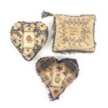 Three large format pin cushions, comprising an early 19th cream silk pin stuck pin cushion '