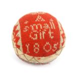 A good early 19th Century knitted pin ball, one side in red and white inscribed and dated 'A Small