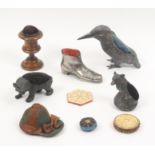 Nine pin cushions, comprising four soft metal examples, a kingfisher, 8.5cm., a bear, 8cm., a fox,