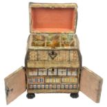 A mid 17th Century silk needlework casket, the front with a pair of hinged doors with a male and
