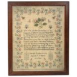 An early Victorian Sampler 'Sarah Richardson aged 7 years, 1839' with central verse amid jardini