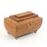 A Regency tooled tan leather sewing box for a child or doll, of elaborate sarcophagal form with gilt
