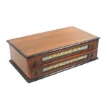 A late 19th century walnut two drawer counter reel chest the front with two drawers with inset
