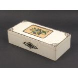 A late 19th century French sewing box of rectangular form, the white lacquer ground with polished