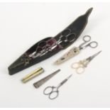 Scissors and sheaths comprising an attractive set of three graduated file cut steel scissors by