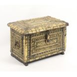 An 18th Century Zanzibar teak casket covered in decorative brass ware, ring side handles, brass