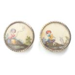 Buttons - a pair of late 18th Century buttons, each painted on ivory with a figure in open