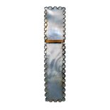 A Palais Royal style mother of pearl needle case, of rectangular form with ball form border, gilt