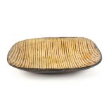 A large late 18th Century or earlier rectangular slipware comb decorated baking or loaf dish,