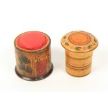 Two pieces of early painted whitewood Tunbridge ware, comprising a ring painted cylinder pin poppet,
