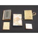 Five needle books comprising a Sadeli ware example 7.5cm, a floral pierced bone example, 5cm,