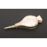 A mother of pearl pin cushion in the form of a set of bellows, 9cm