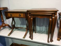 Walnut nest of tables and a drop leaf table