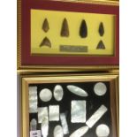 Collection of mother of pearl counters and arrow heads