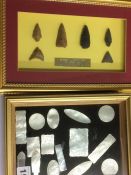 Collection of mother of pearl counters and arrow heads