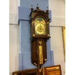 An oak Dutch style wall clock