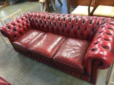 A Chesterfield Oxblood three seater settee