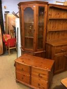 Pine four drawer chest and a pine corner cabinet