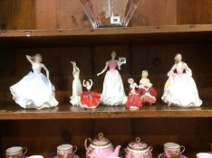 Seven Royal Doulton figures