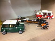 Four Lego models including a Mini Cooper etc.
