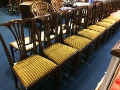 Two sets of four single dining chairs
