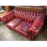 A Chesterfield Oxblood two seater settee