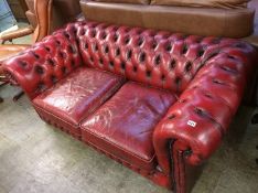 A Chesterfield Oxblood two seater settee