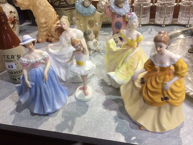 Two Royal Doulton figures and three others