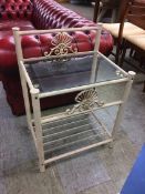 A pair of metalwork and glass side tables