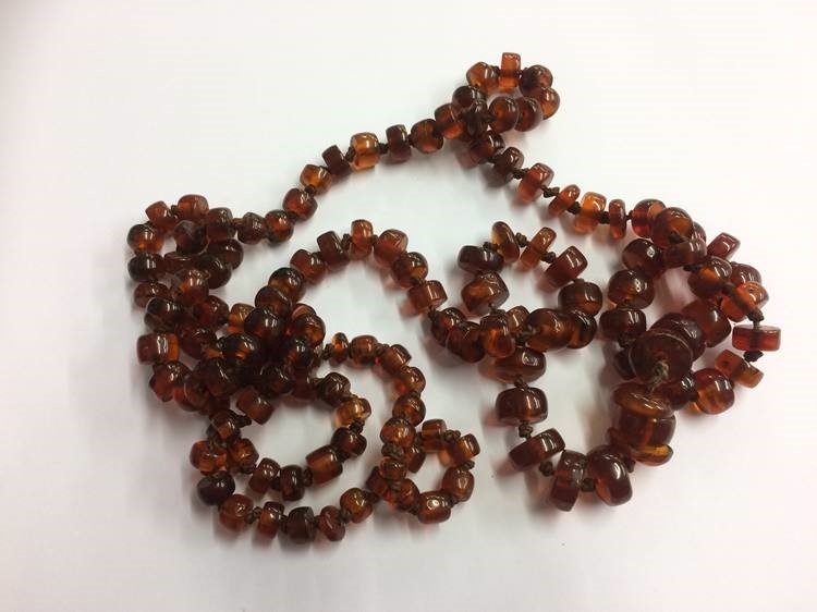 Quantity of amber coloured beads