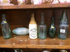 Five glass bottles including; Palatine Bottling Co, Read and Sons, W Mitchell, R Ellis and Sons,