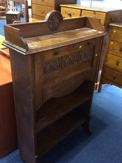 A narrow oak bureau