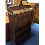 A narrow oak bureau