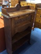 A narrow oak bureau