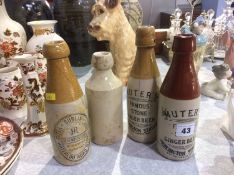 Four stoneware bottles (a/f)