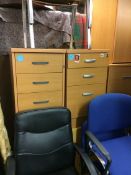 Four office drawers and five office chairs